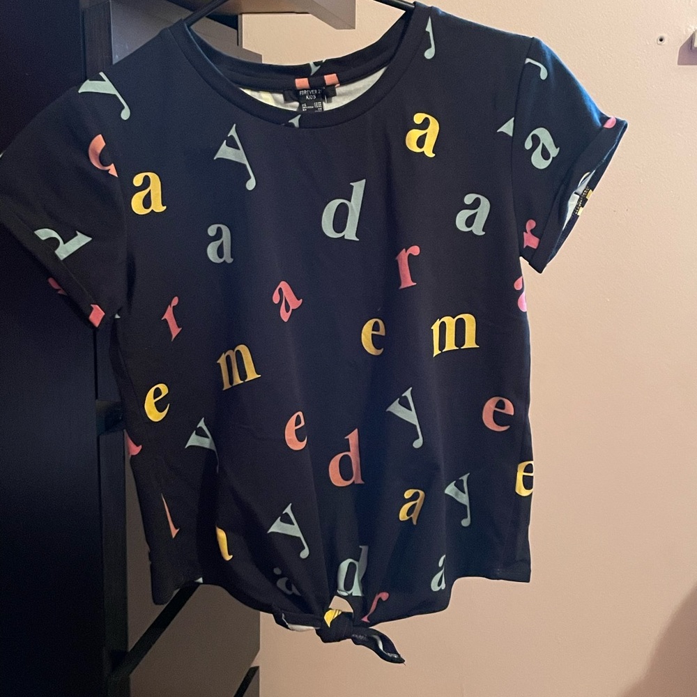 Letter shirt.  Great for a kid who loves to read!